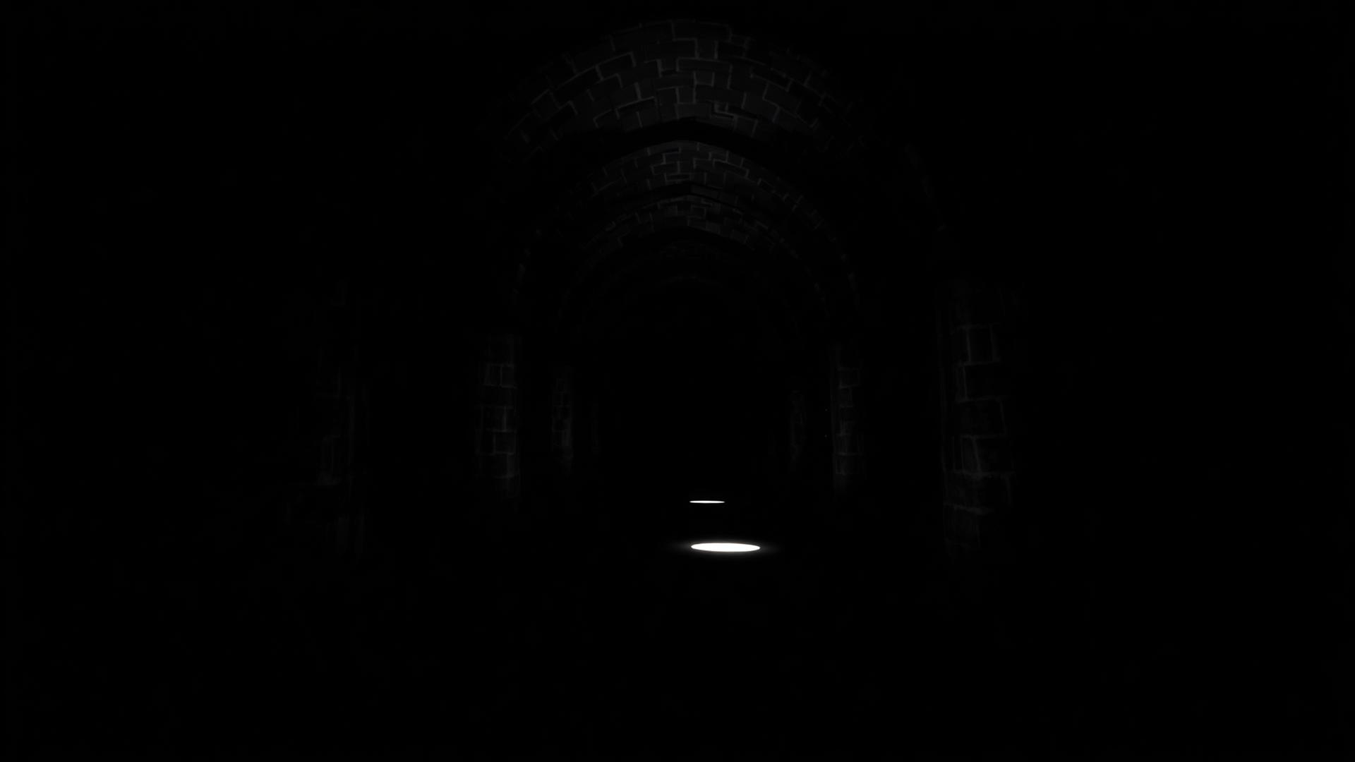 Long couloir sombre traversé d’un point de lumière au loin